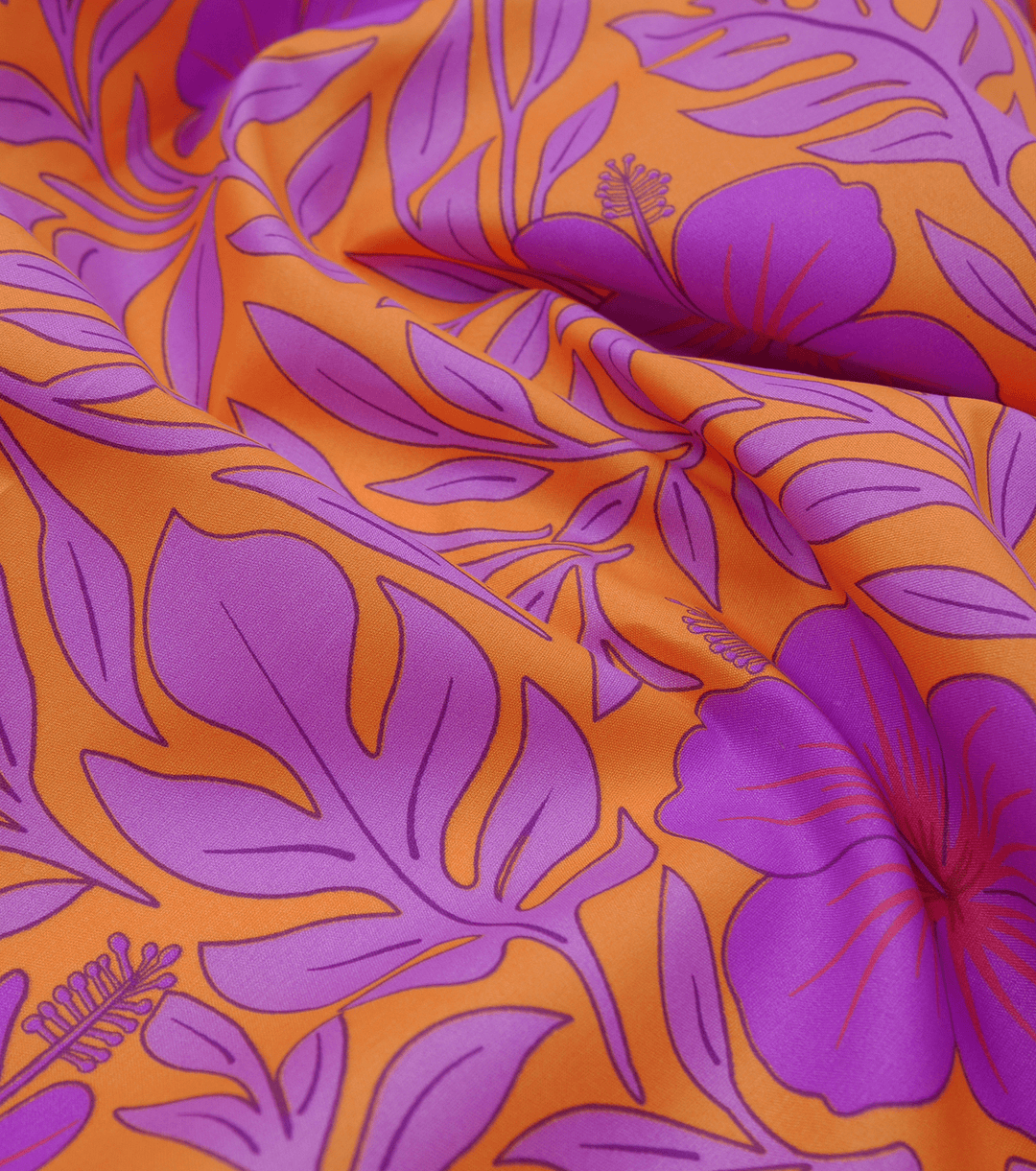 POLYESTER / COTTON PACIFIC PRINT $3.00P/M - ORANGE &amp; PURPLE - The Fabric Shop