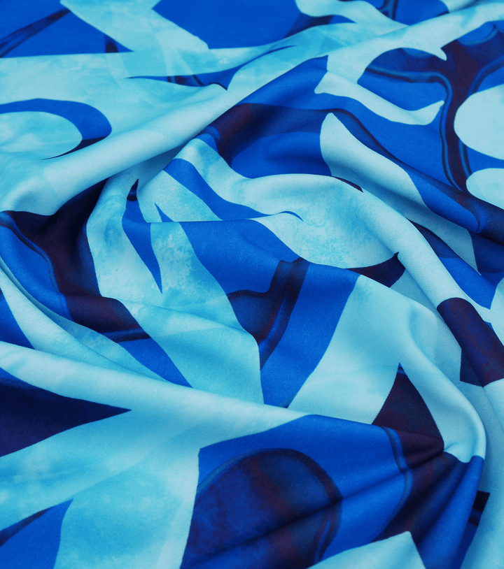 STRETCH POLYESTER PACIFIC PRINT $12.00P/M Blue - The Fabric Shop