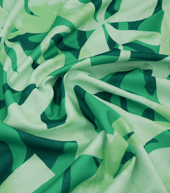 STRETCH POLYESTER PACIFIC PRINT $12.00P/M Green - The Fabric Shop