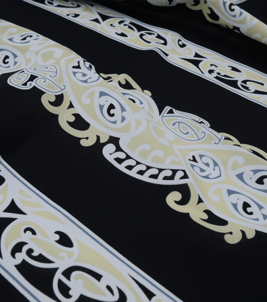 Cotton Maori Koru Design $8.00p/m - Beige - The Fabric Shop