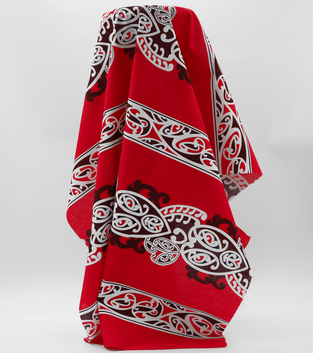 Cotton Maori Koru Design $8.00p/m - Red - The Fabric Shop