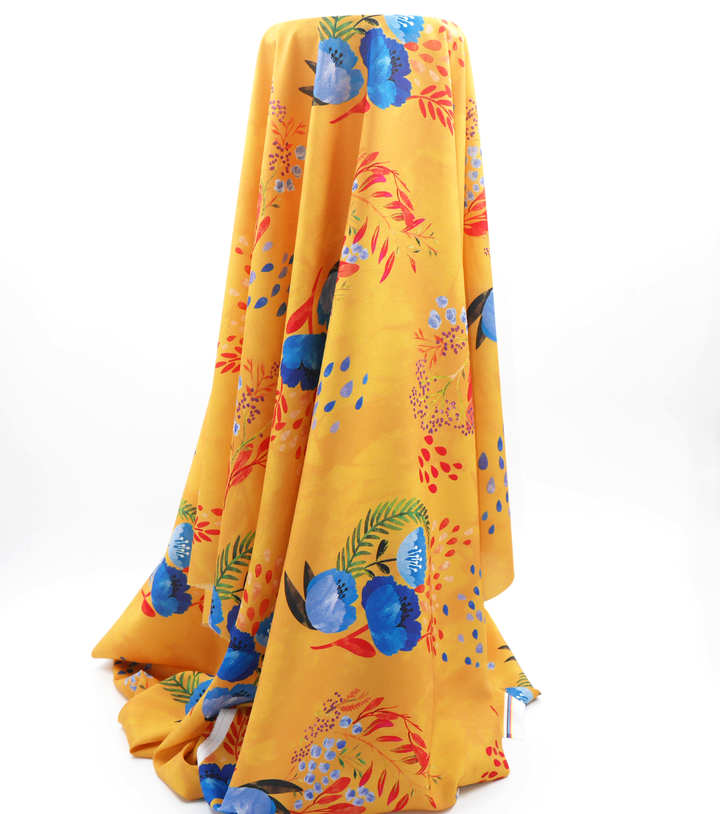 Printed Polyester $5.00p/m - Gold w/ blue flower (Online Only)